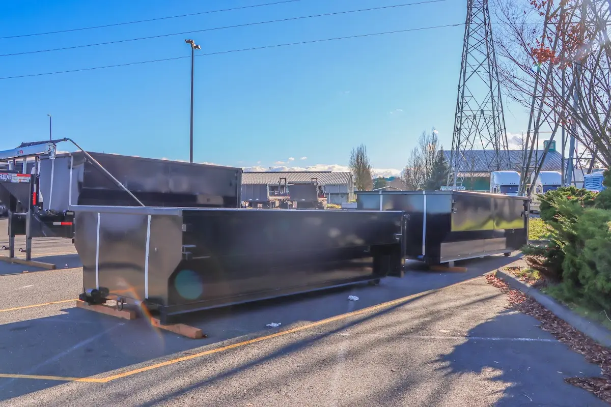 Roll-off dumpster ready for waste disposal at job site for Demolition Dumpster Rental in Waterloo